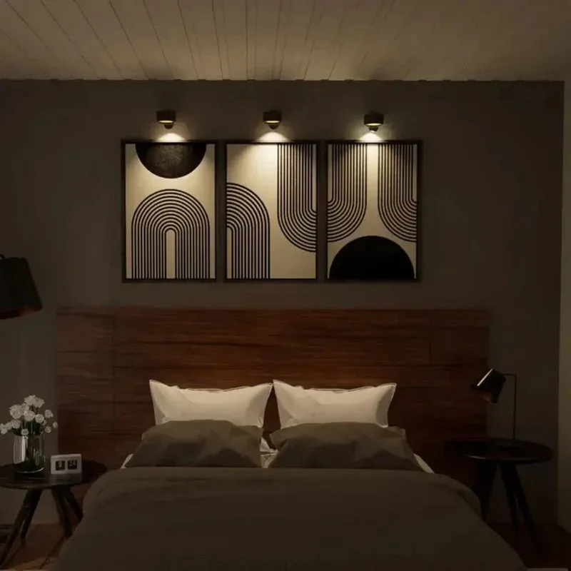 Wall lights creating a warm bedroom atmosphere